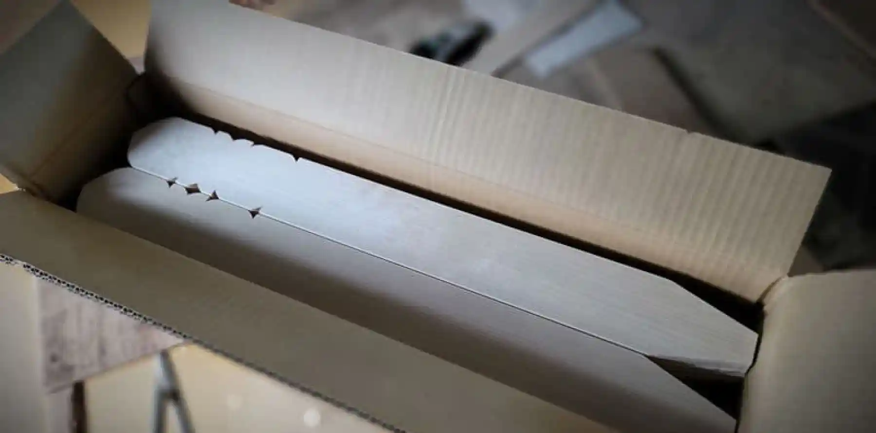 ダンボール梱包フッター